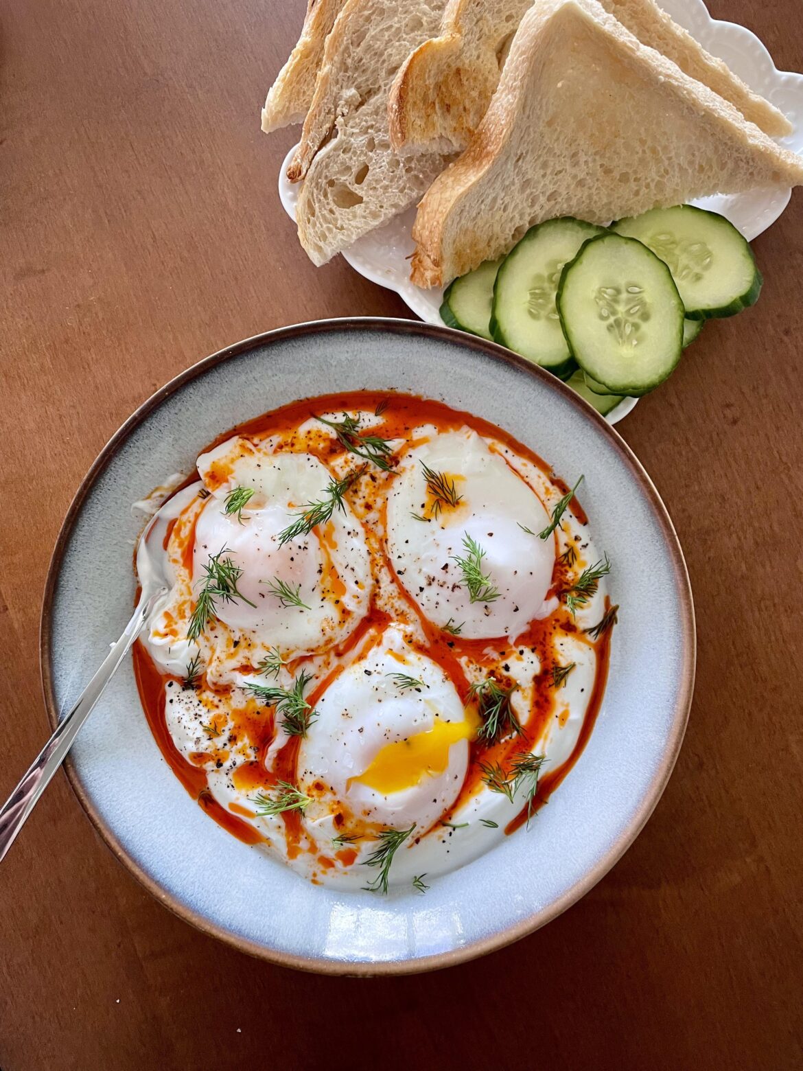 Yoghurt, but put 3 eggs on it (aka Çılbır, Turkish eggs)