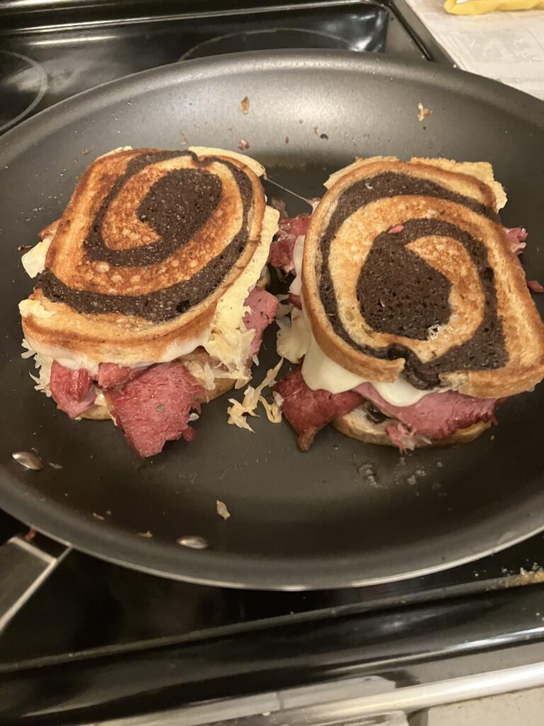 One of my freezers died the other day so I had to cook a corned beef.  Tonight I made my wife and I a reuben.  And then I posted the photos in a weird order.
