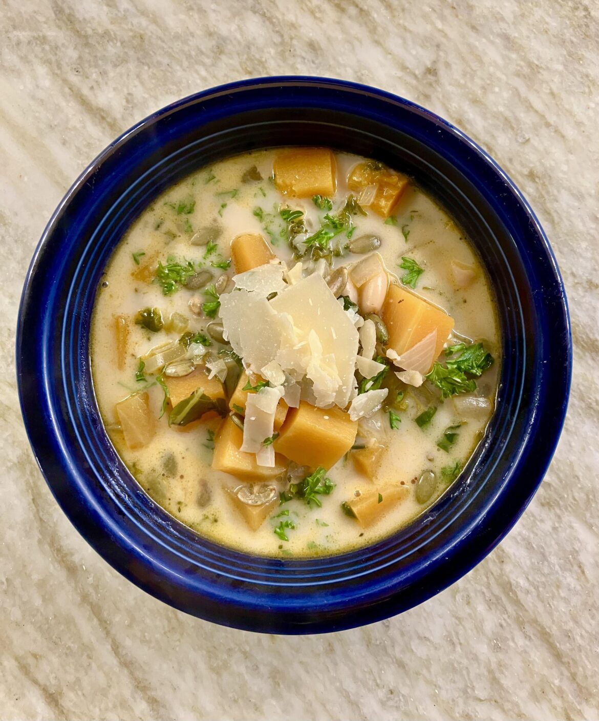 First time making this: Butternut Squash, Kale and White Bean Soup. So good!