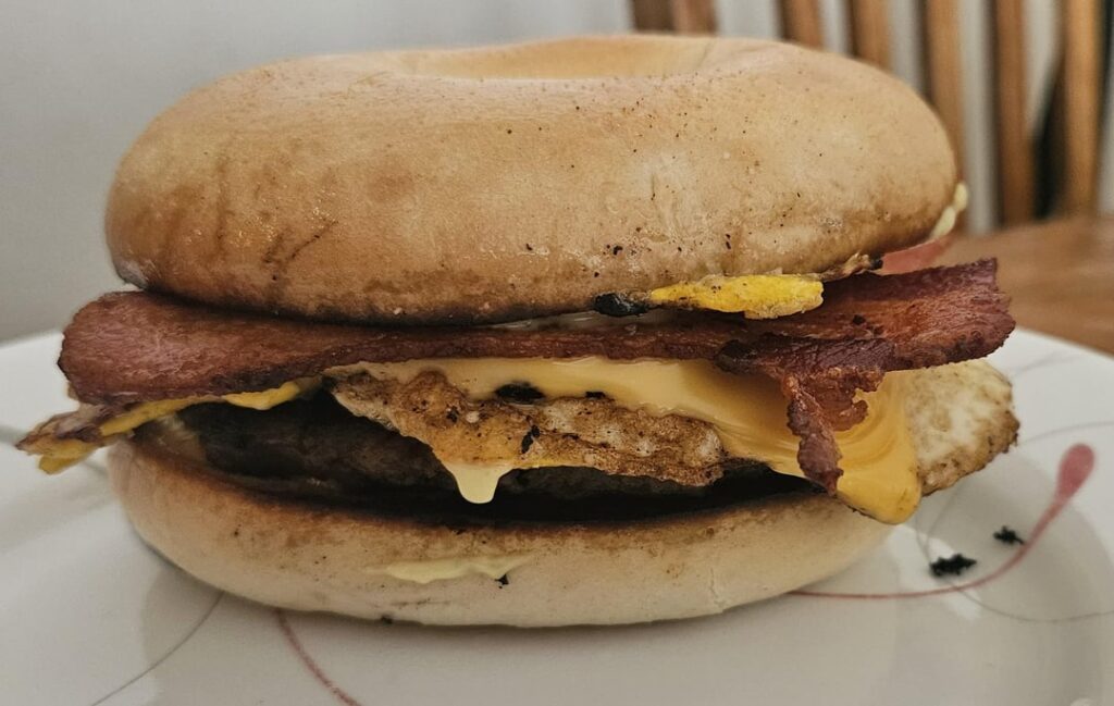 Bacon, sausage, egg & cheese bagel.
