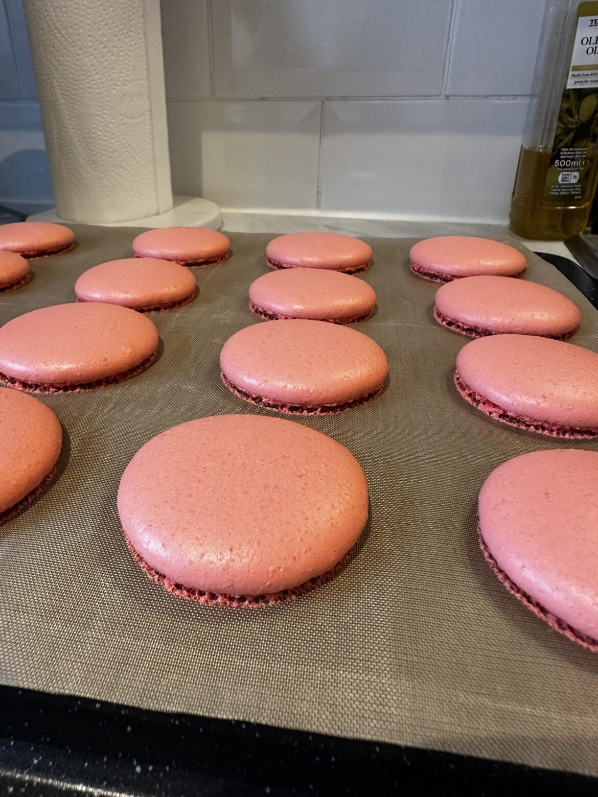 Any suggestions how to have tall feet on macarons? Mines tend to separate. Could it be teflon sheet?