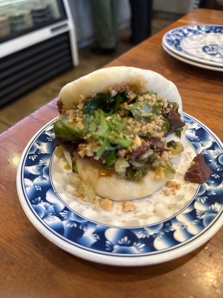 Dan Dan noodles, Hot and Sour Soup, and Clamshell Bun with five-spice beef from Joy on York. All super good.