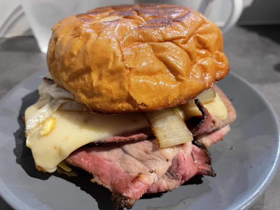 Brisket, white cheddar, grilled onions, and a “dippy egg” on buttered brioche.