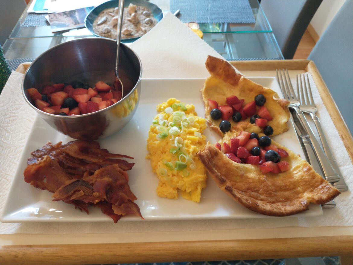 German Pancakes, French-Style Scrambled Eggs with Scallions, Bacon, and Fresh Fruit