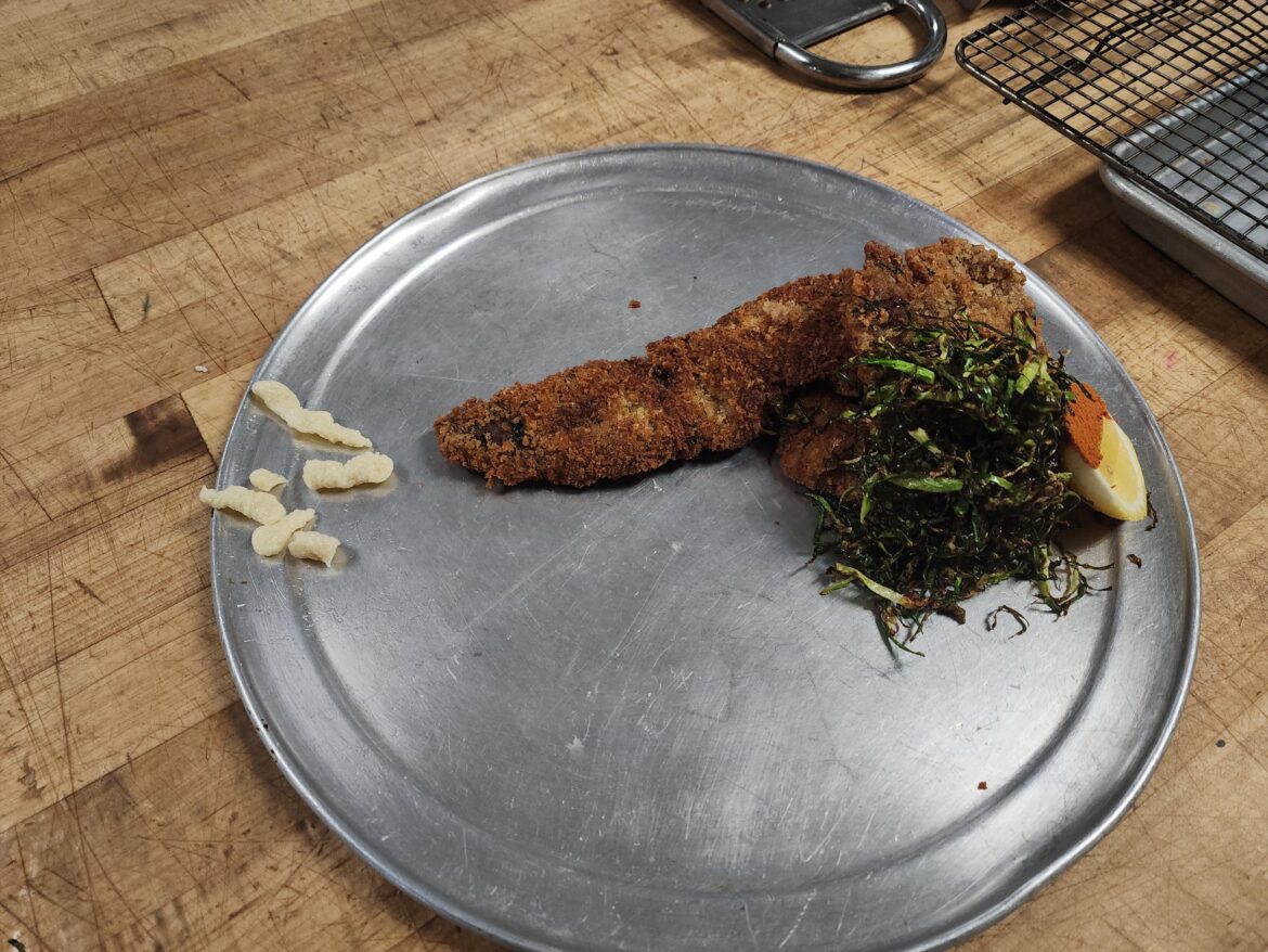 Schnitzel.Fried Chiffonade of Brussels Sprout.Spätzle