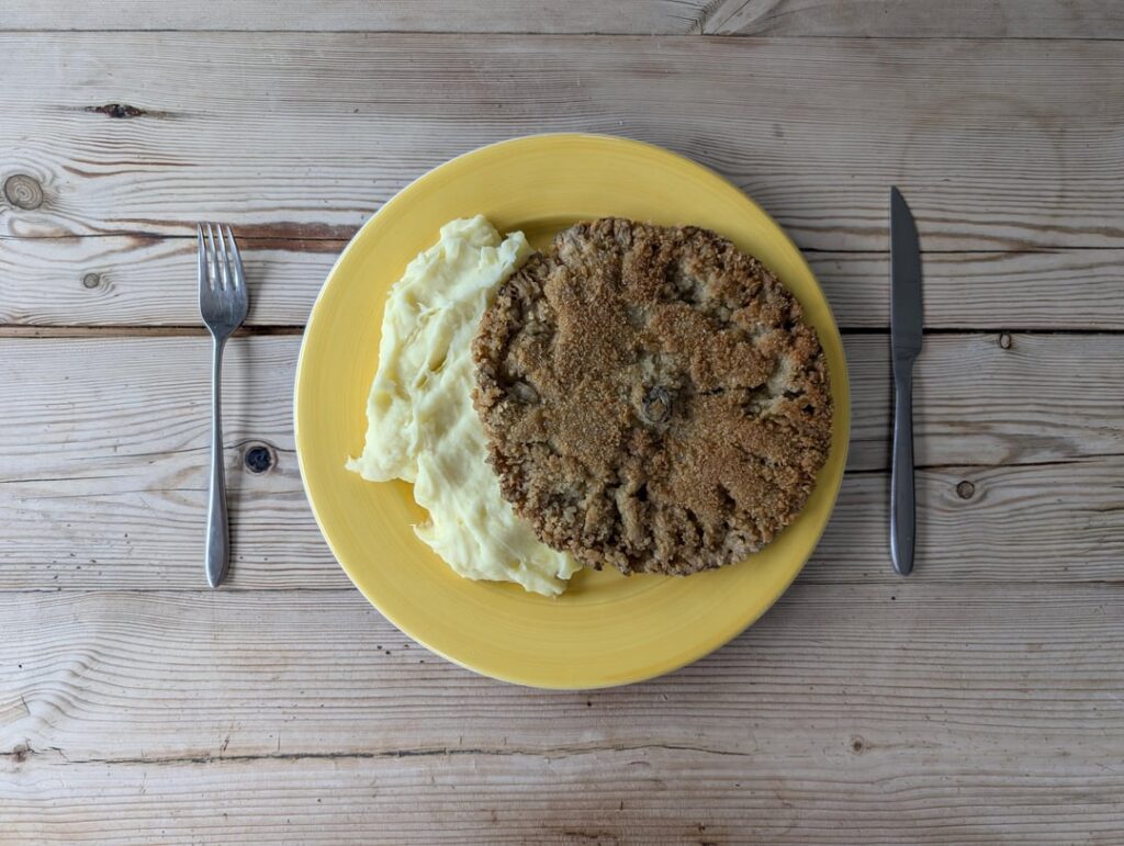 A giant mushroom schnitzel I foraged in New Forest and mash 🍄