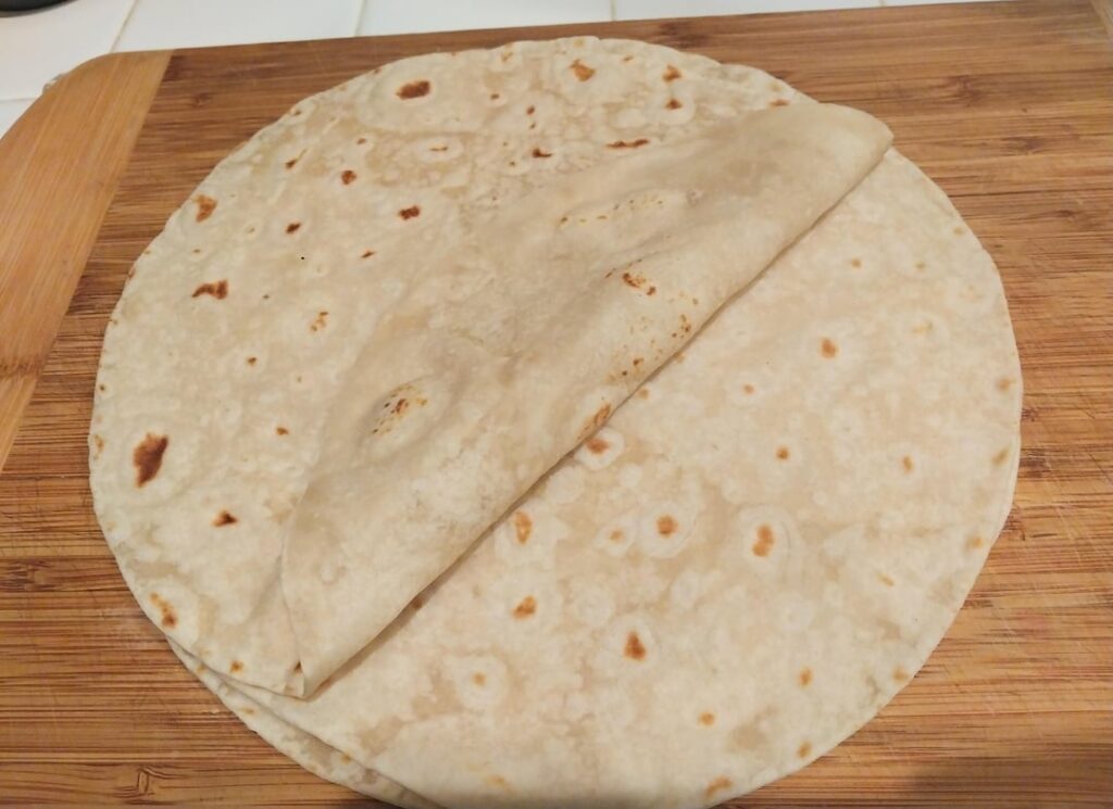 Trying to save money. Tortillas are Flat Bread right lol? First time making Burrito sized Tortillas.