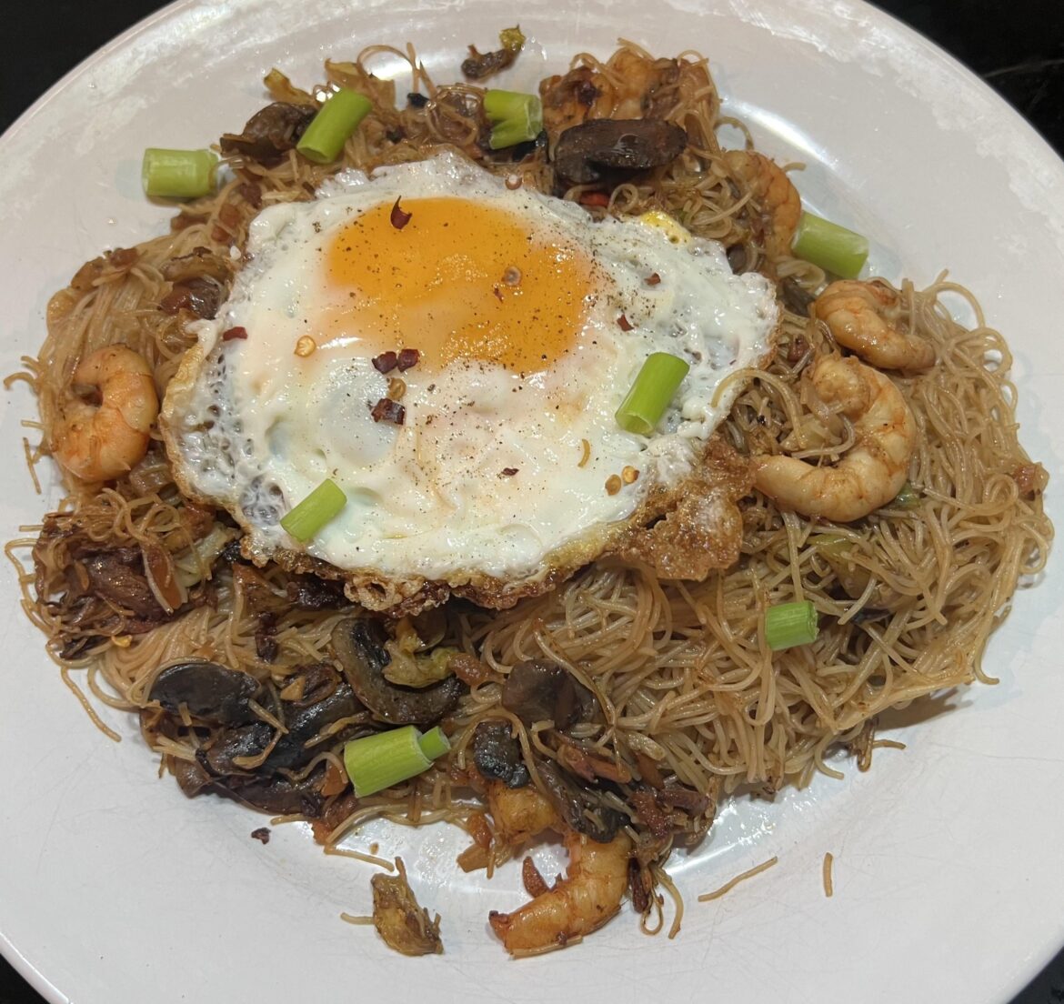 Mushroom and vegetable stir fried prawns with rice noodles