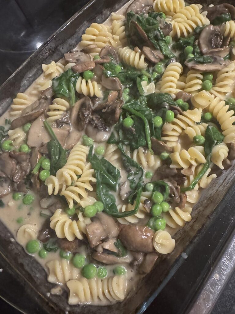 Mushroom, pea and spinach pasta bake.