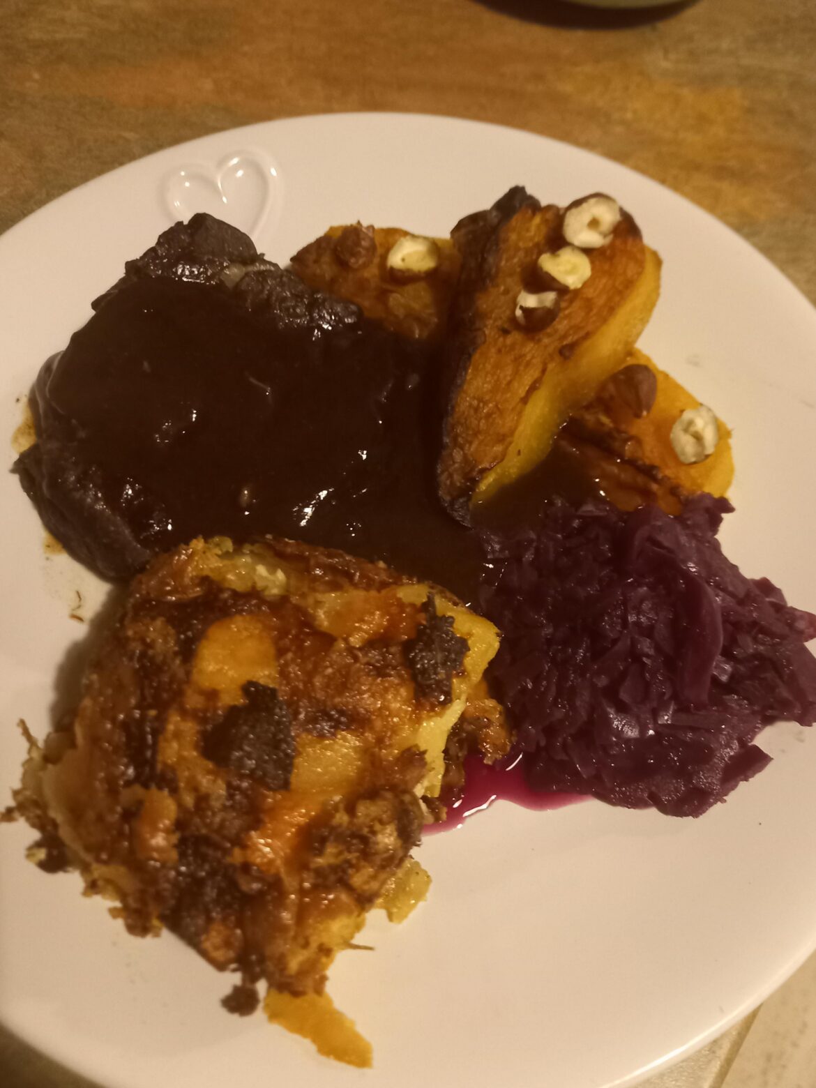 8 hour slow braised beef shin, potato & sweet potato dauphinouse, roasted pumpkin and hazelnuts with red cabbage.