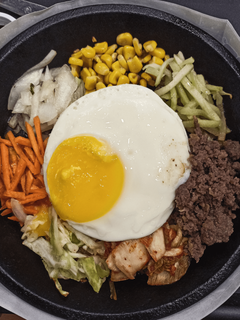 First time trying bibimbap! Did I mix it right? Swipe to check 👀
