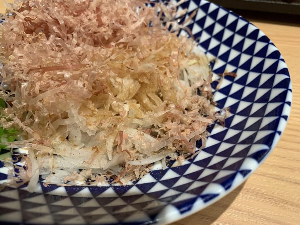 Onion salad at a sushi place in Kasai, Tokyo
