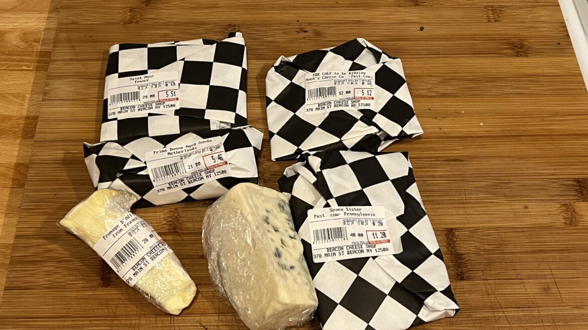 What would you pair with these cheeses on a small, two-person charcuterie board?