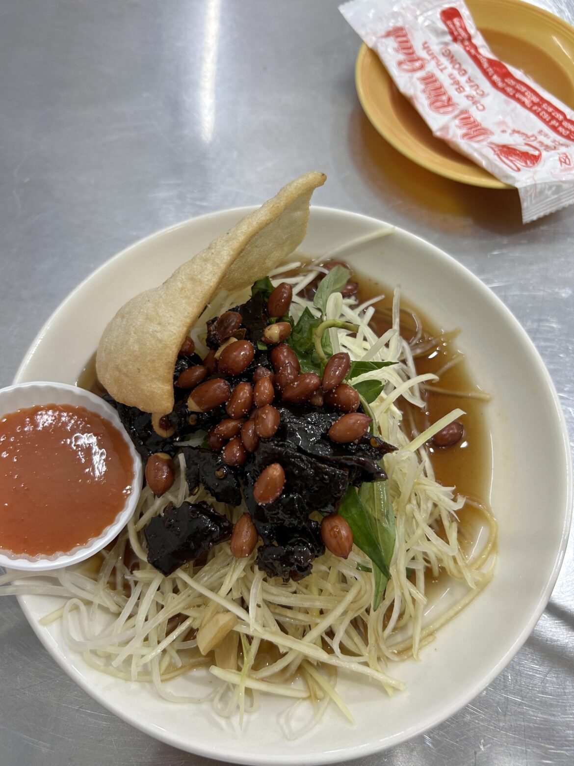 Papaya salad with a candied beef jerky in Saigon