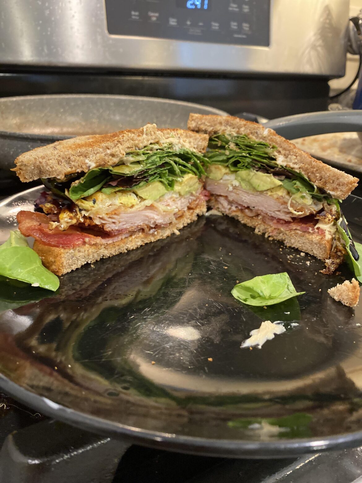 Turkey, Bacon, Fried Egg, Avocado, Spring Mix, Balsamic, Hummus, Mayo, Everything but the Bagel Seasoning.