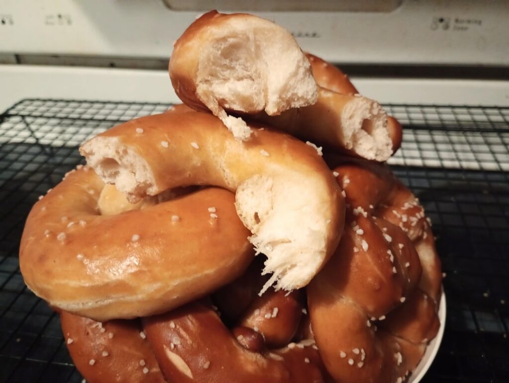 Experimented with a higher hydration ratio for my pretzels and they came out ridiculously soft and light, like a fresh yeast roll that collapses under the weight of buttering.