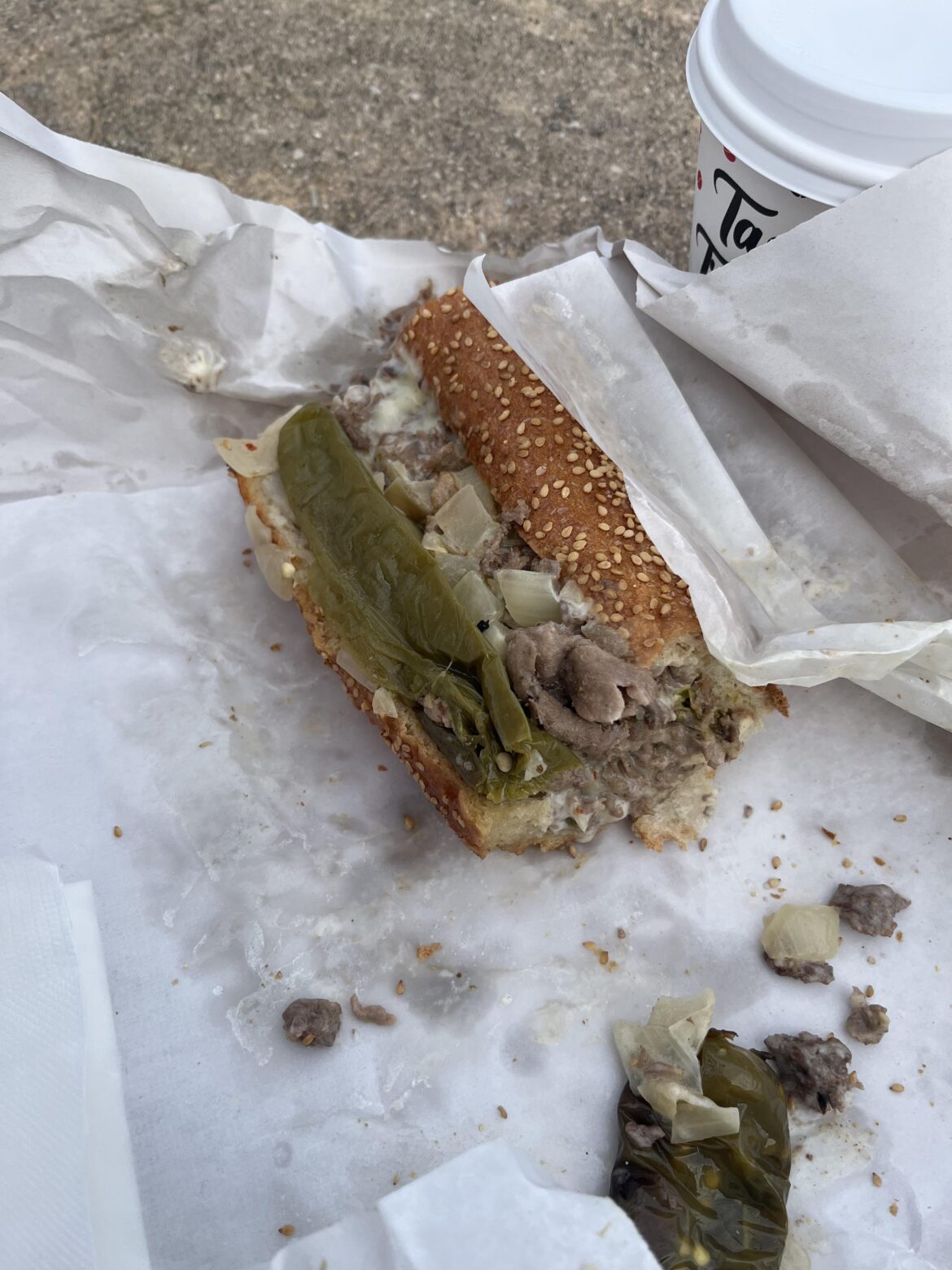 The gang eats a cheesesteak