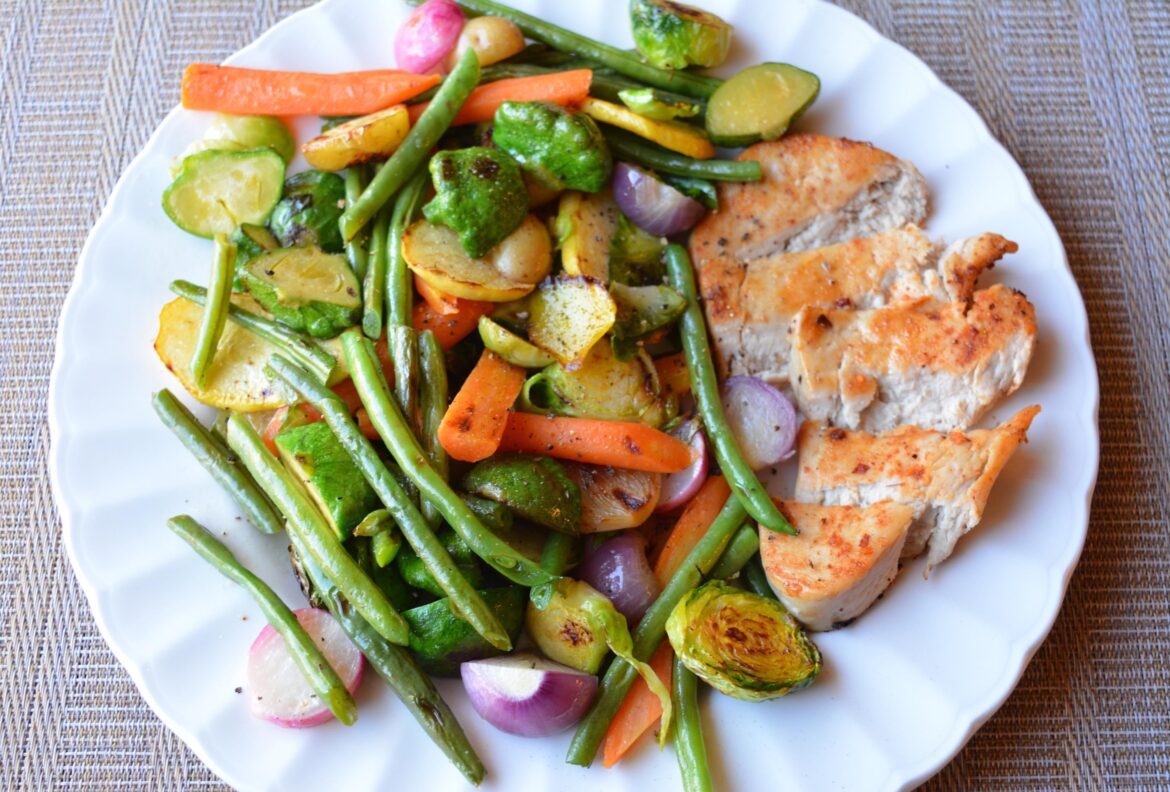312 cal, 26 g protein. Pan fried baby vegetables with seasoned chick'n cutlet (Meati)