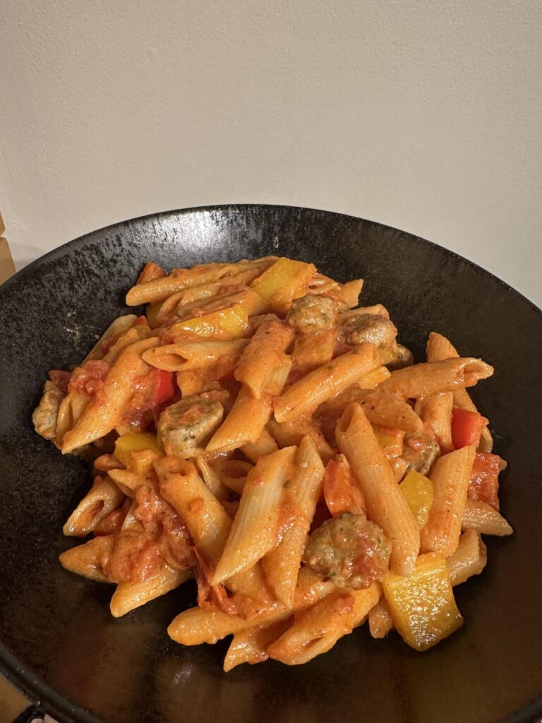Spicy italian sausage and peppers pasta w/ creamy tomato sauce