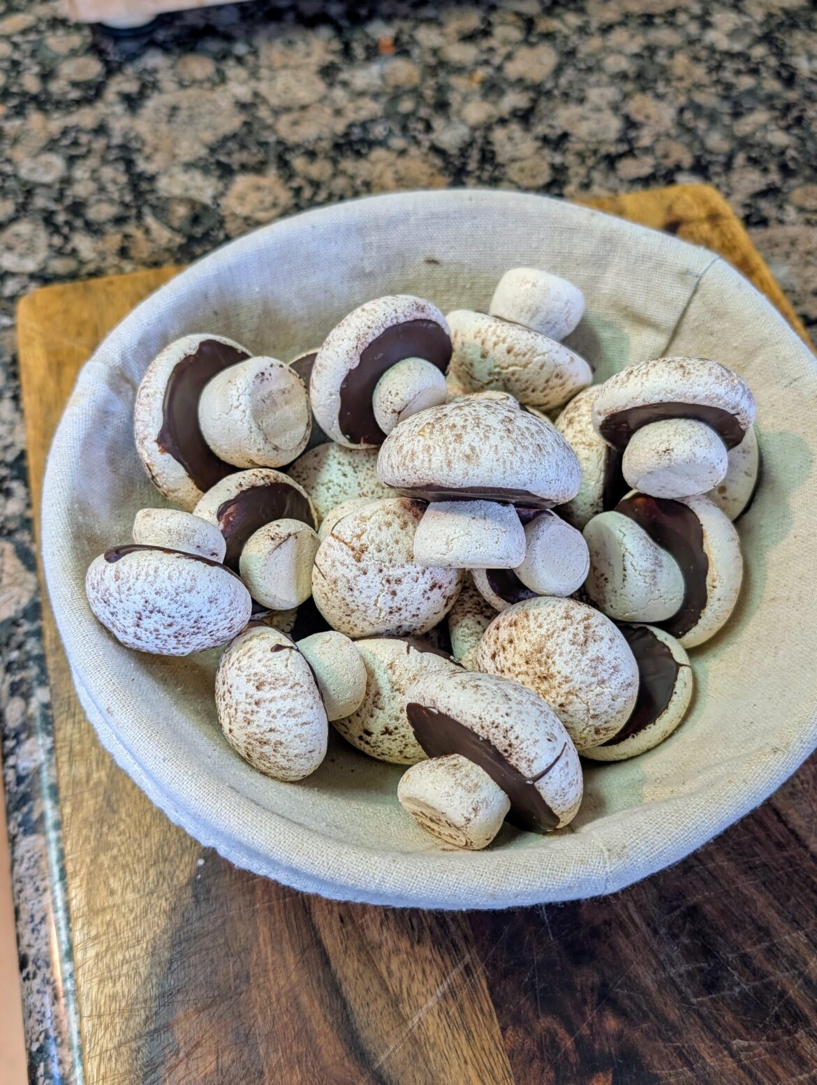 Planning on making a yule log so I'm practicing my meringue mushrooms