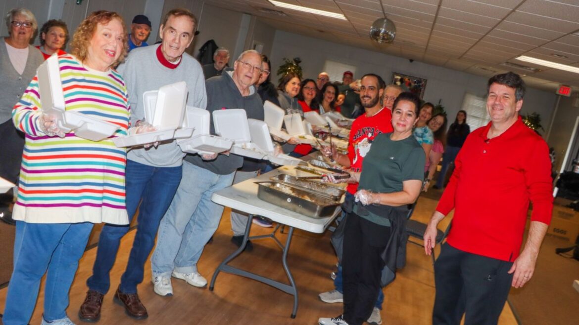 South Jersey volunteers prepare hot meals as a Christmas present for people in need