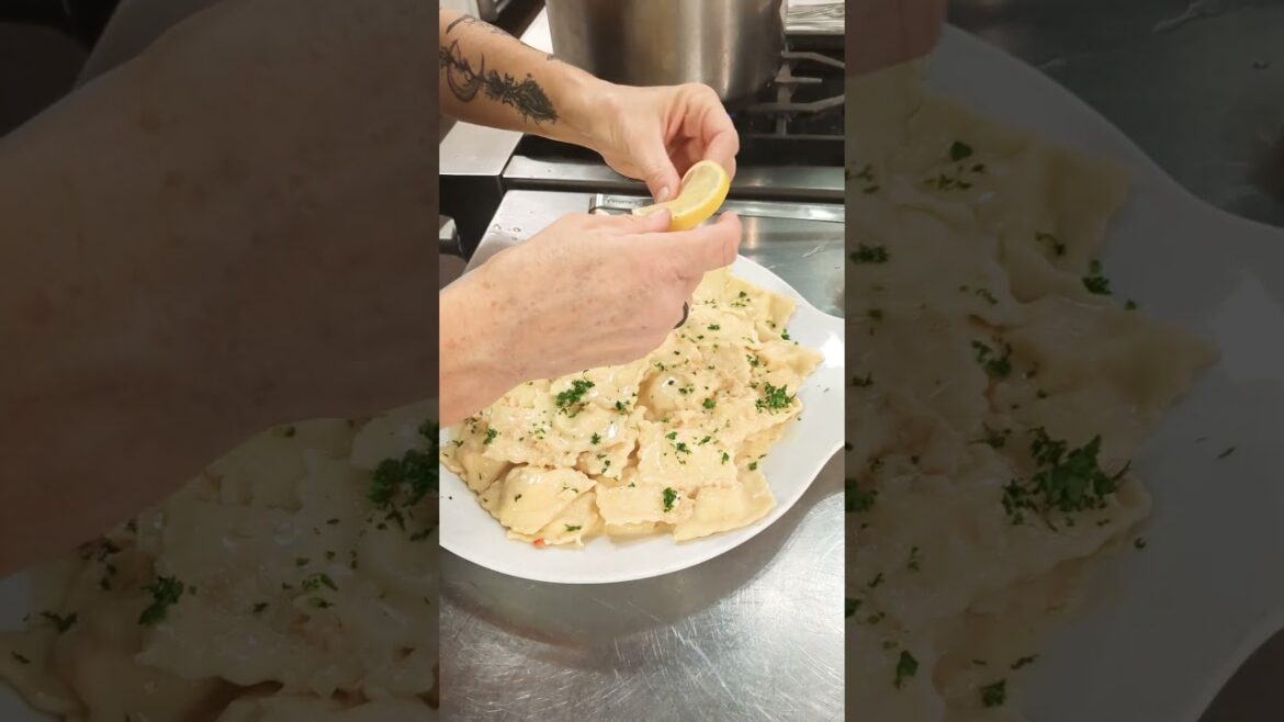 Garnishing Lobster Ravioli with Sauce Beurre Blanc
