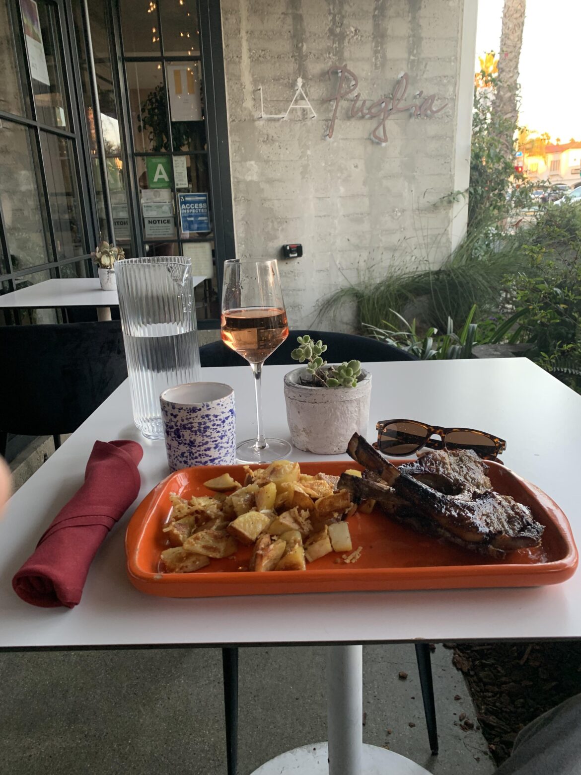 Lamb chops in orange sauce with potatoes and Pecorino from LA Puglia, on Wilshire in Santa Monica