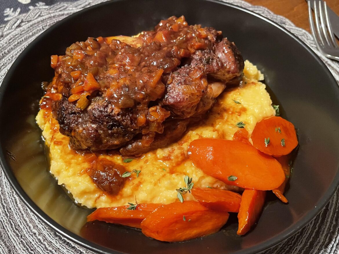 Osso Buco with hickory smoked cheddar polenta and bourbon glazed carrots