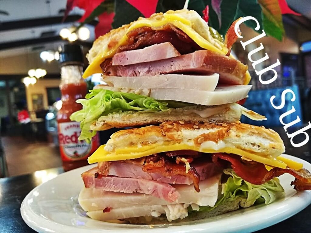 Day 2 Sandwich Week a proper Club Sandwich Ham, Bacon and Turkey. 90 percent restaurants make with only Turkey n Bacon, that's a Turkey sandwich. Sami's Taylor Mi get you one.