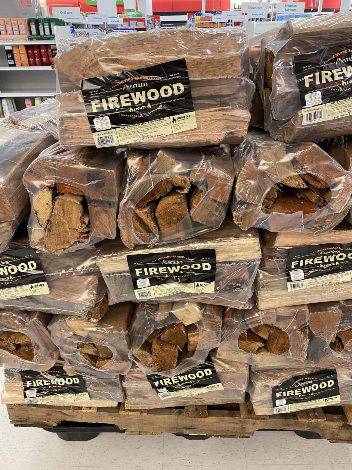 Can I use regular firewood for grilling?