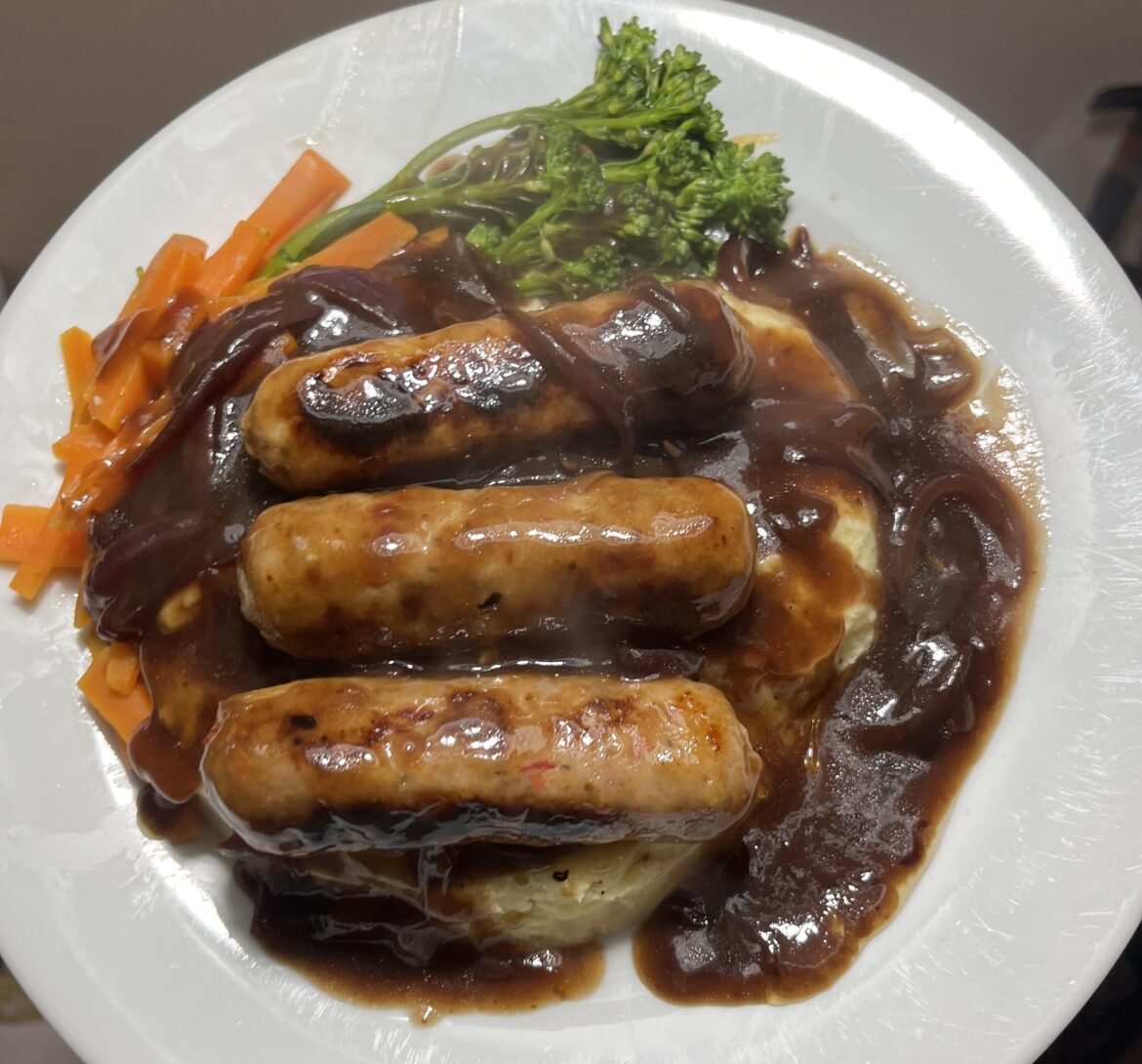 Sausage and mash with red wine and caramelised red onion gravy