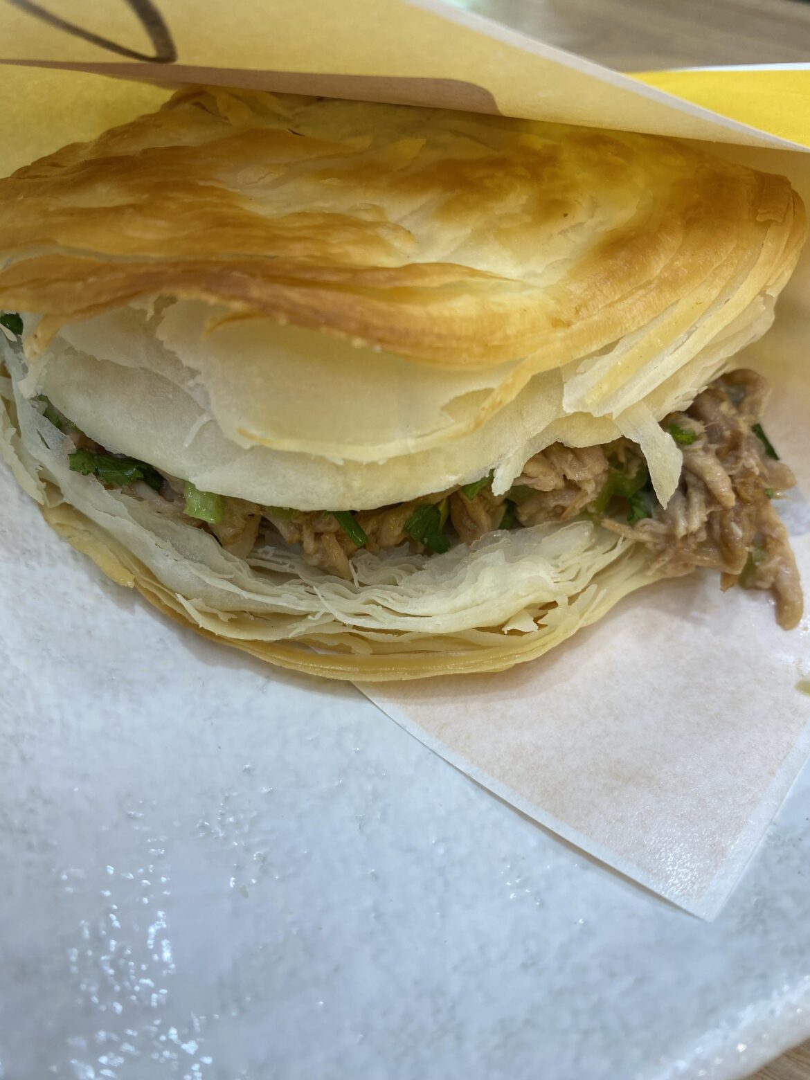 Rou Jia Mo is one of the best things ever... BBQ pork and onions in a pastry bun. Addictive