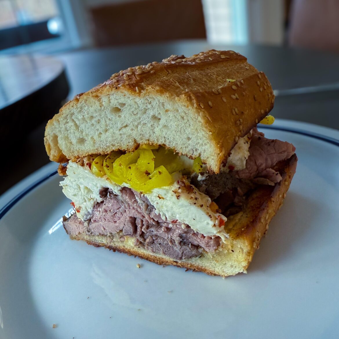 My new hero sandwich: Roast beef on bomba calabrese garlic bread with spicy bocconcini and banana peppers