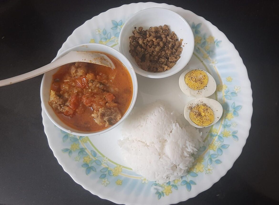 Tomato mutton curry with steam Rice