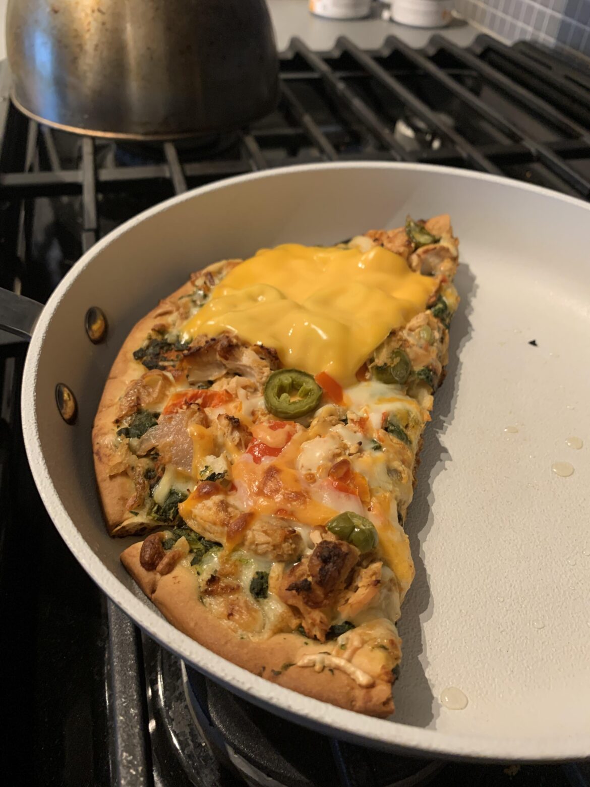 Leftover pizza reheated on the stovetop is best