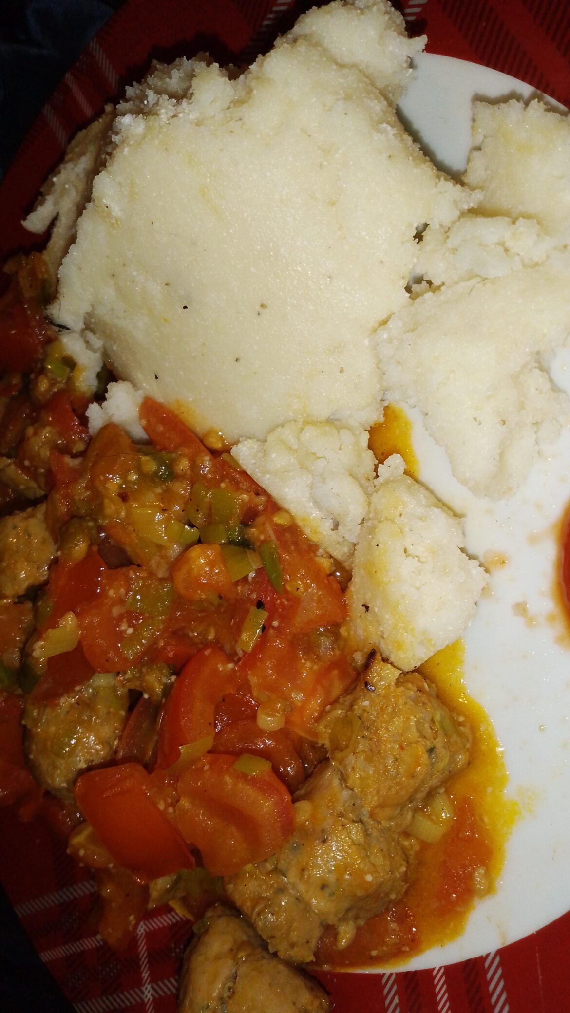 Sadza sausage and tomato with spring onion