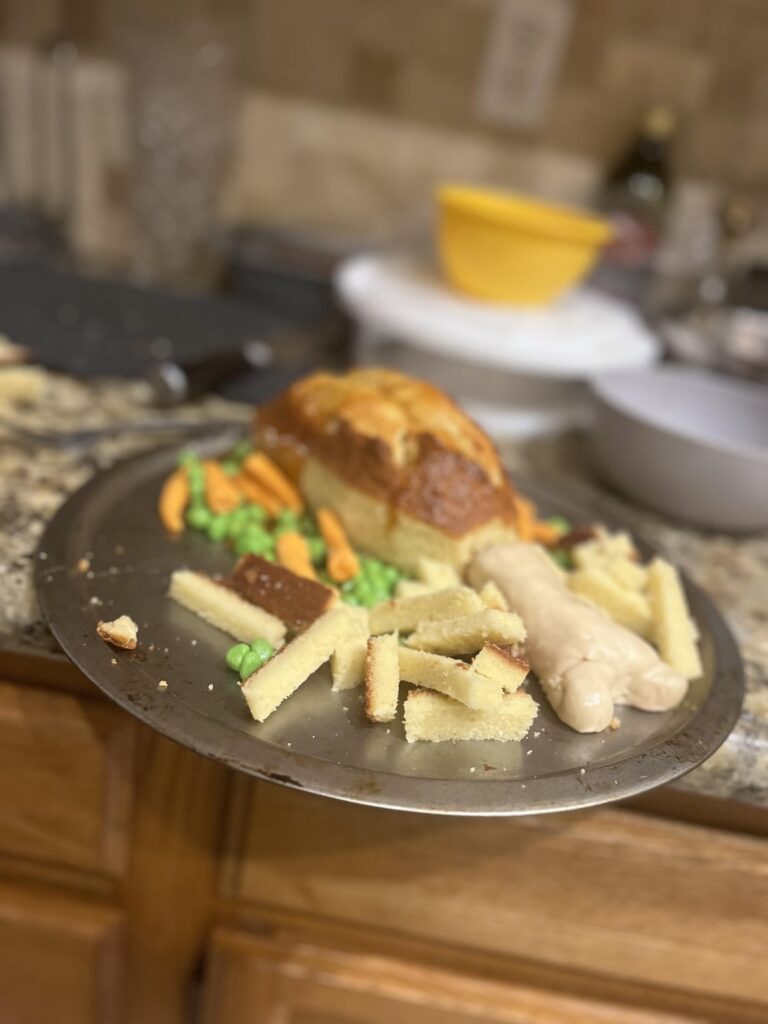 My seven year old is getting into baking and made this “Turkey leg dinner” cake.