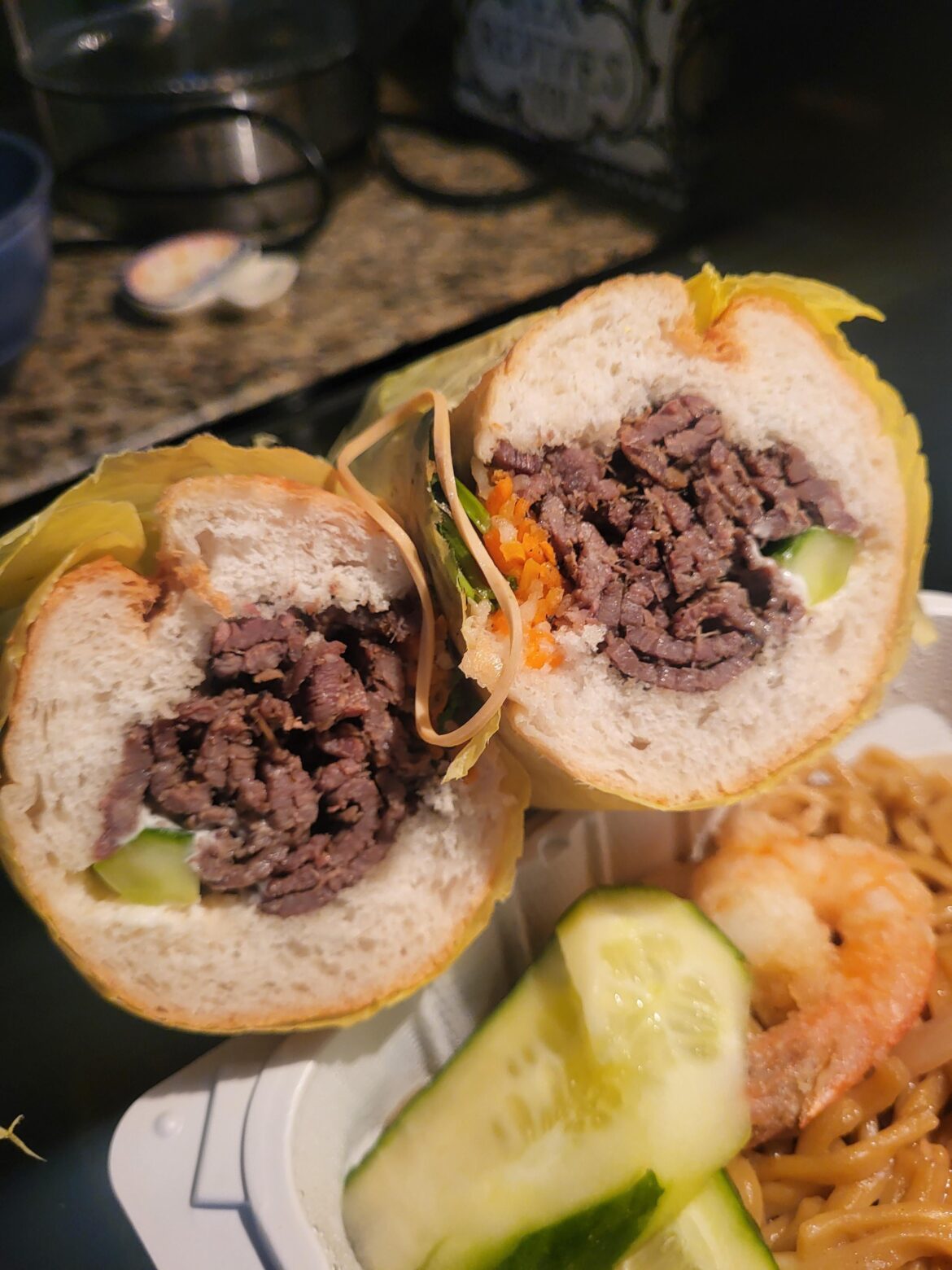 BBQ beef banh mi with everything except the pâté (rubber band was not ingested). Added some red chili oil post pic. $9!