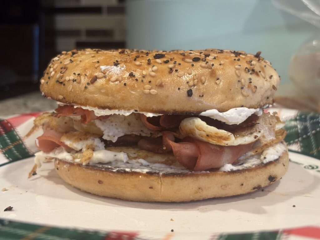 Pan-toasted everything bagel w/ cream cheese, couple a fried eggs, and pan fried mortadella and capicola. Swipe > for the money shot