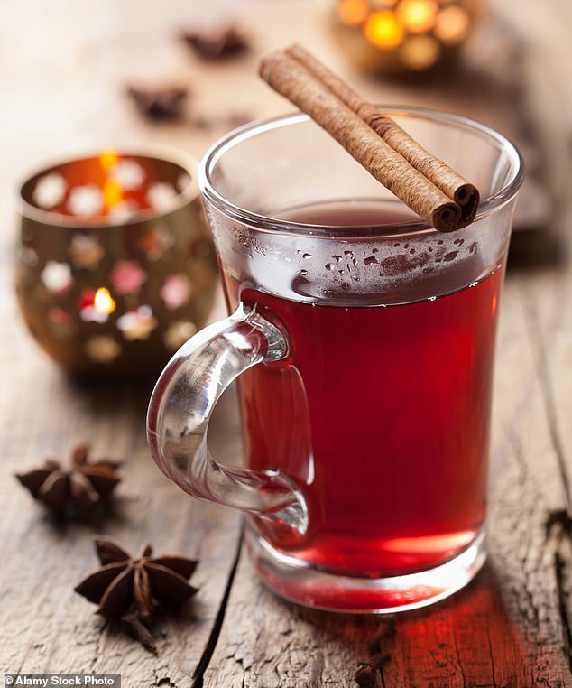 Researchers have found that mulled wine increases bodily warmth (file photo)