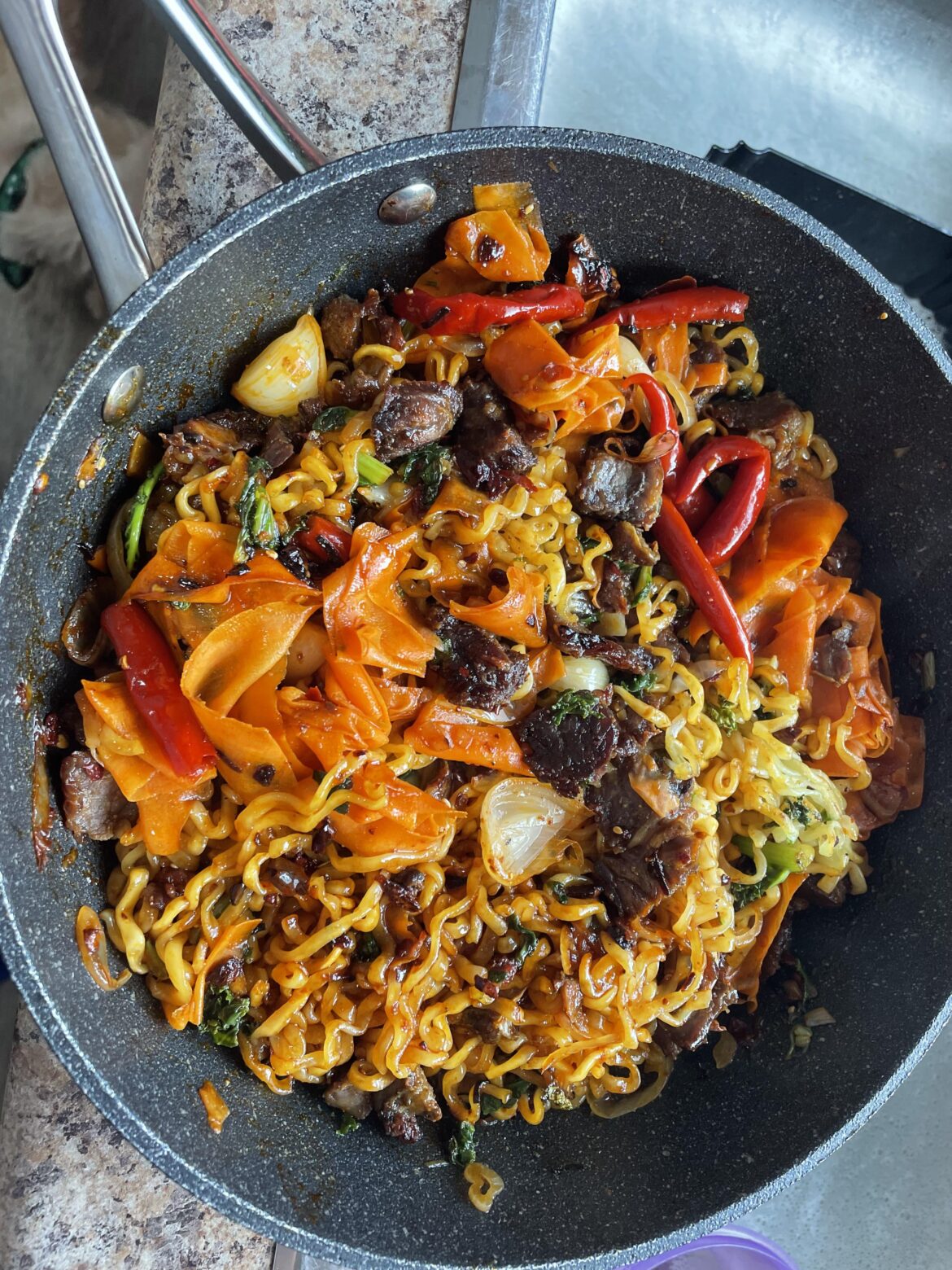 This started life as a pack of Volcano Chicken noodles.