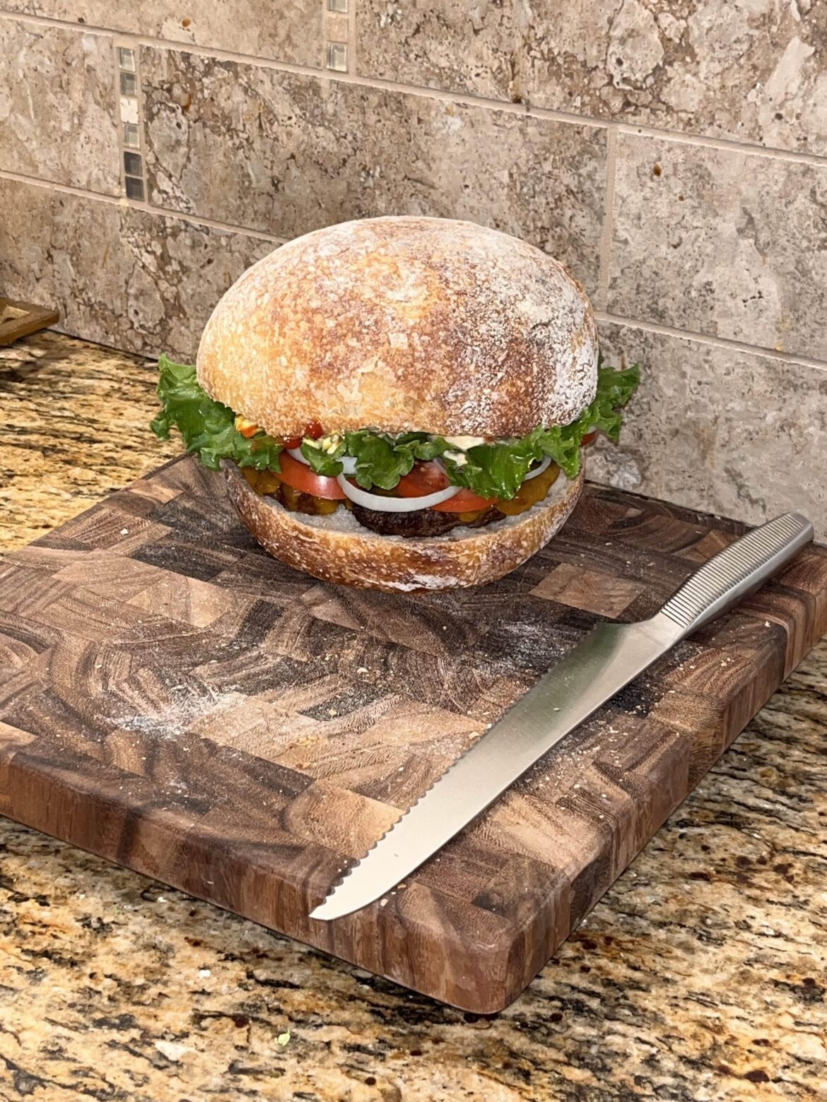 Forgot to score my sourdough. Made a big burger out of it.