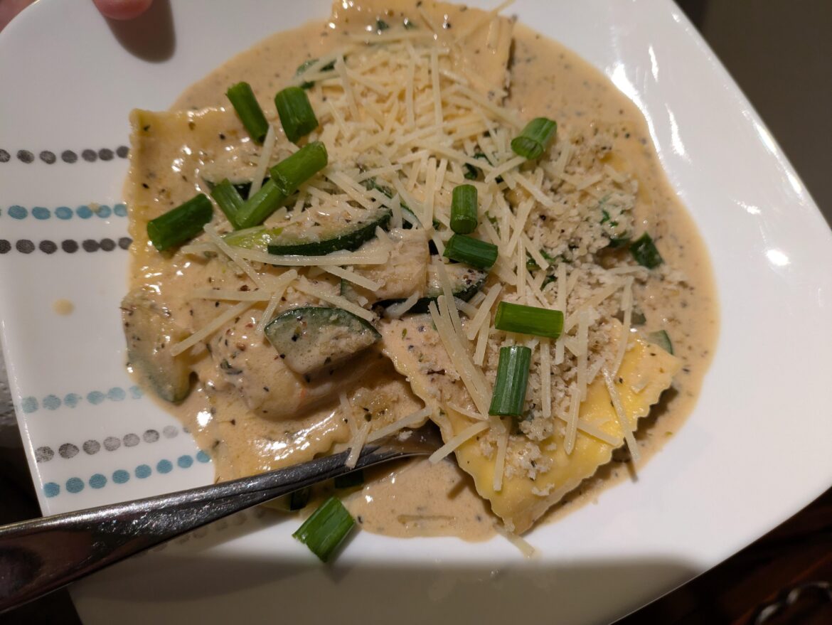 Ricotta ravioli in garlic cream sauce