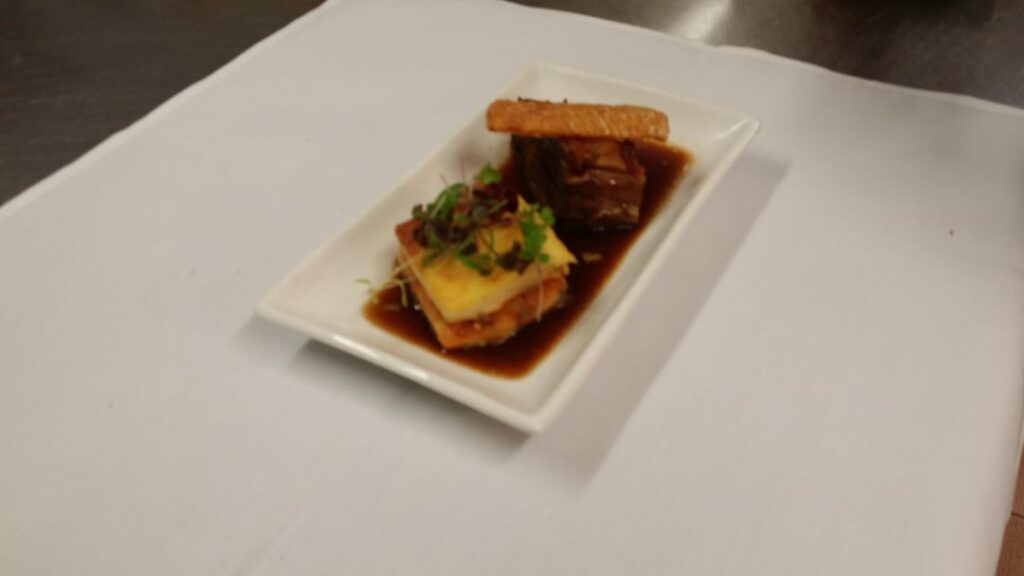 Honey and lavender braised pork belly with a chilli and banana bread and butter pudding.