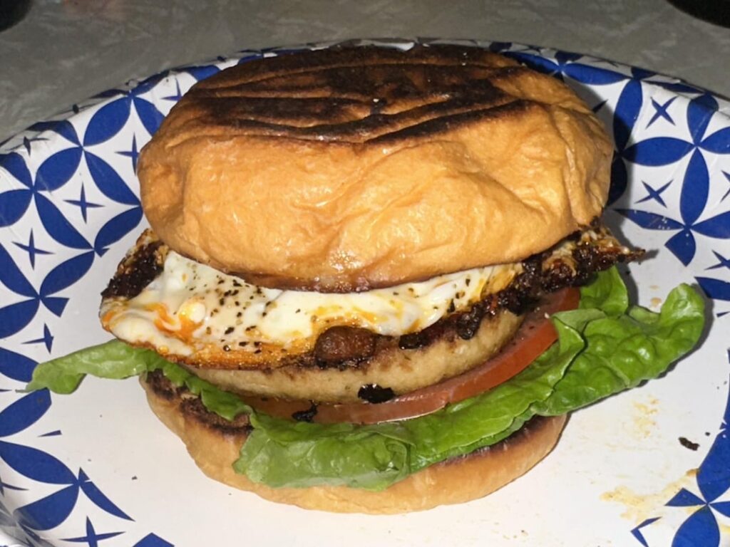 Salmon burger with chili oil fried egg