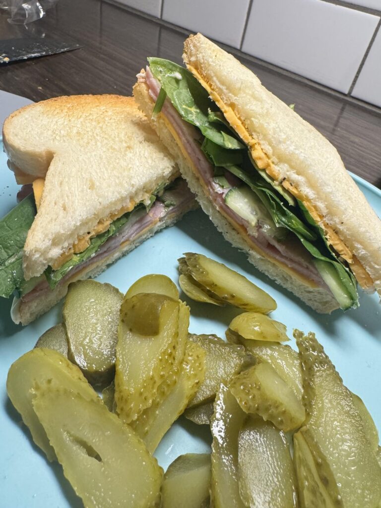 Ham, cheddar, spinach, cucumber, mayo, mustard lightly toasted on white.