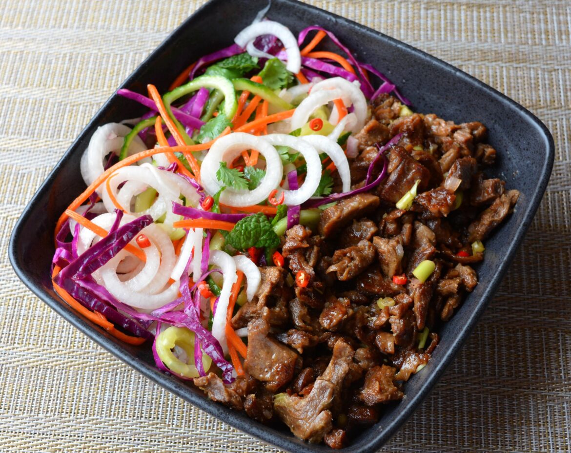 37 g protein, 376 cals. Vietnamese pickled vegetables with lemongrass seitan (Beyond Steak).