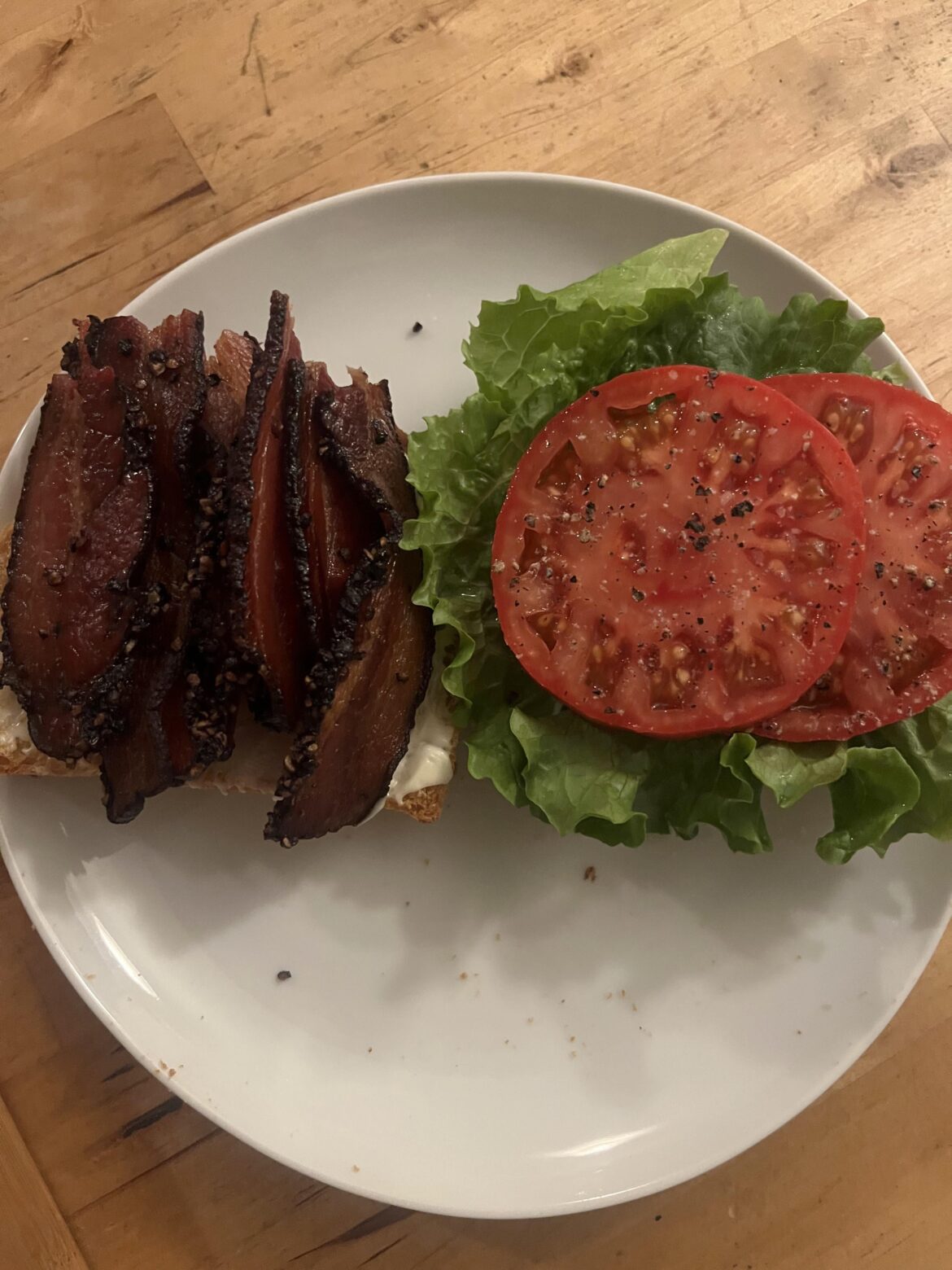 Maple peppered bacon, lettuce, and heirloom tomato. On english toaster bread under