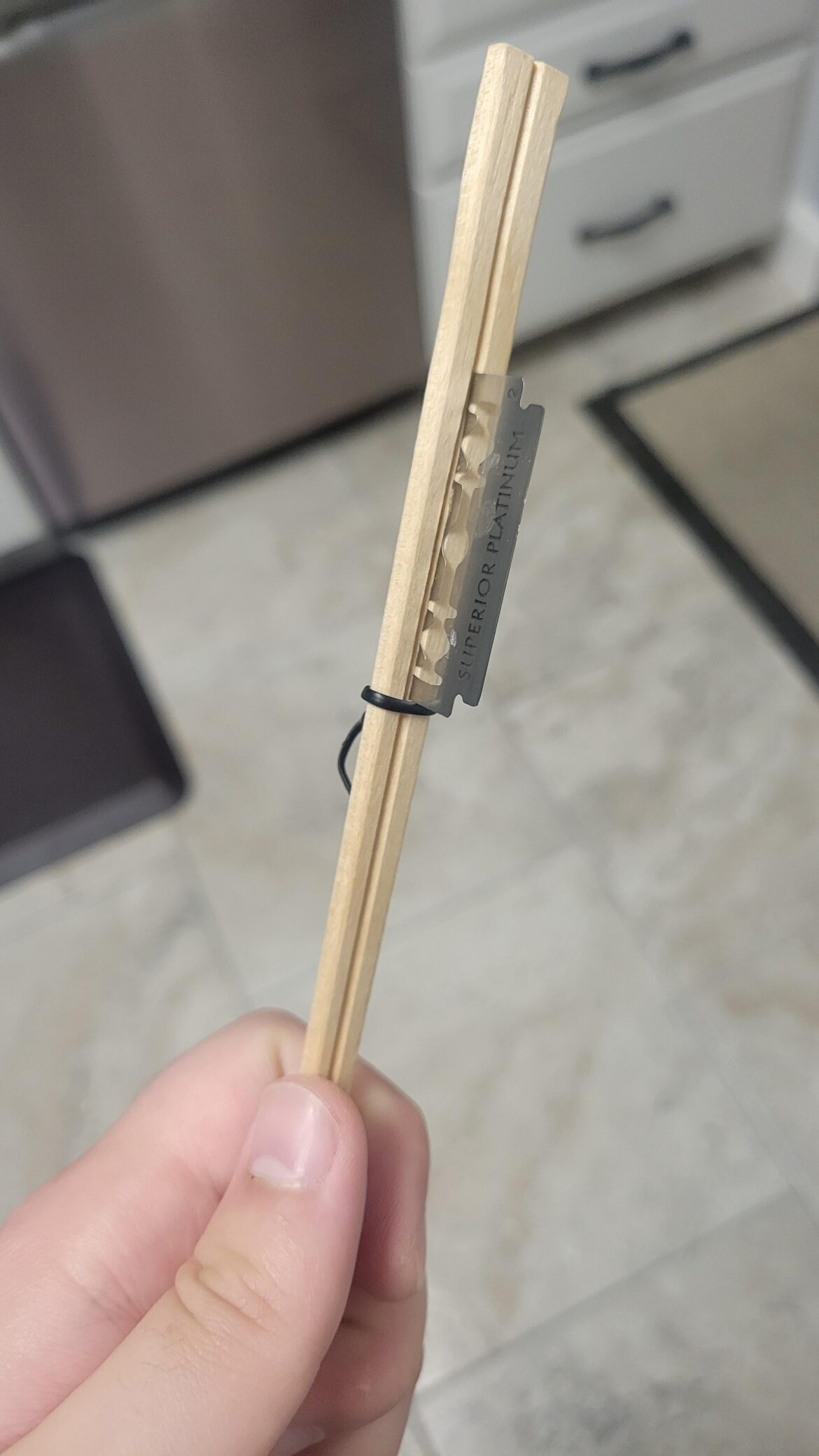 Home for the holidays and my mom insisted I make her bread. Had to MacGyver this withunused chopsticks and a bread tie.