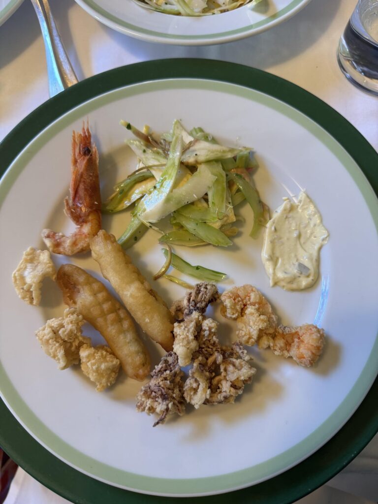 Calories in this fritto misto (I ate 4 more shrimps, 5 more calamari, the long things are some kind of vegetable with thick breading) with tartare sauce, artichokes and celery with parmesan and olive Oil, and fish soup?